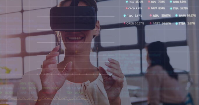 Image of financial data processing over businesswoman using vr headset