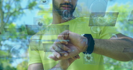 Image of data processing over biracial sportsman checking smartwatch