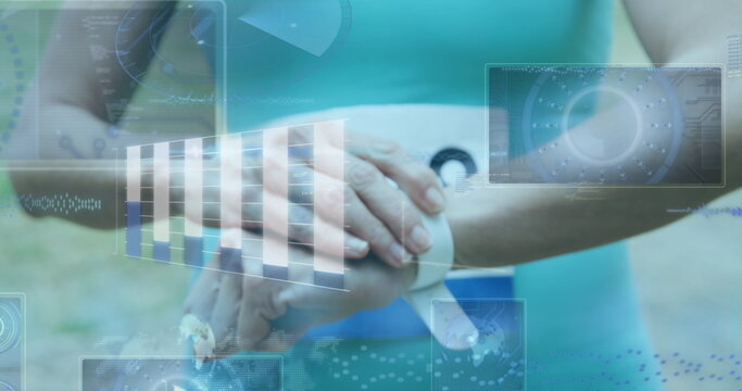 Image of data processing over biracial sportsman checking smartwatch