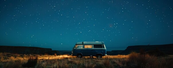 Fototapeta na wymiar Camper van under starry sky, symbolizing van life adventure.