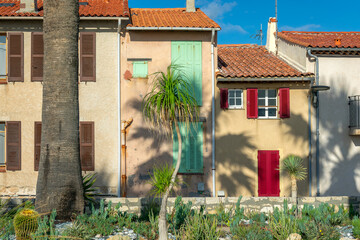 Provencal houses in the town of Antibes on the French Riviera in the South of France - 757999209