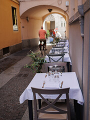 Small Tables set up Outside on a Street in Parma, Italy