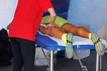 Athlete's Legs Professional Massage Treatment after Sport Workout: Fitness and Wellness
