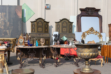 Antique Wooden Stuffed - Furniture, Cabinets, Sofas, Chairs and Mirrors Leaning Outside on the Street