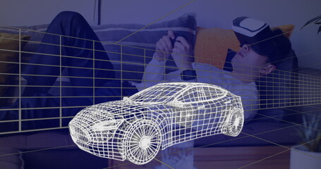 Image of 3d technical drawing of a car in white, with moving grid and a young man using game control