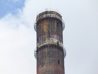 An old non-funcional industrial tower in Baia Mare city, Romania. The tower is about 351 meters high