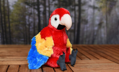 Soft toy for children in the form of a parrot. © Viktoriia Pletska