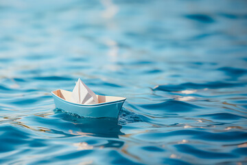 Paper boats on sea waves.
