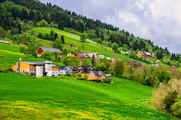 Mountains and Fiord over Norwegian Village in Olden, Innvikfjorden, Norway