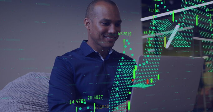 Image of multiple graphs with changing numbers over biracial man working on laptop