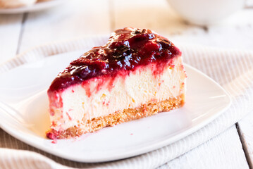 Delicious piece of cheesecake with berries