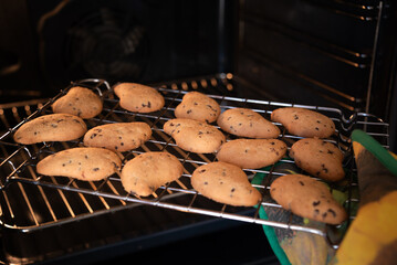 Freshly baked cookies in oven. Homemade food