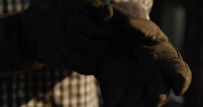 Putting on Welding Glove