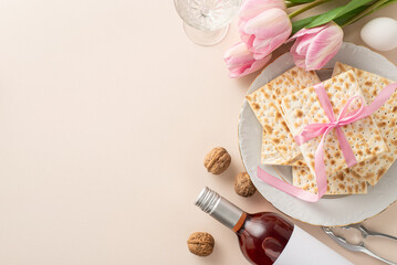 Seder celebration essentials: From top view, matzah wrapped in a ribbon, a red wine bottle, goblet,...