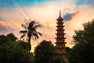 Tran quoc pagoda on sunset in Hanoi city, Vietnam - obrazy, fototapety, plakaty