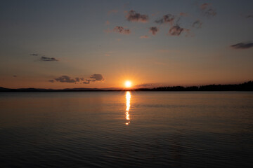 Fototapeta na wymiar Sunset over scandinavian lake