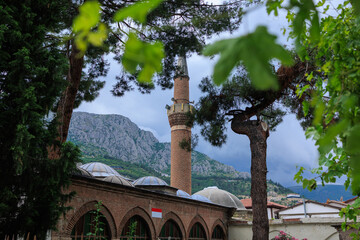 Old Mosques with minarets in Istanbul, Turkey. Details of architecture and interior, arches and...