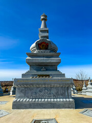 Fototapeta na wymiar Karma Tekchen Zabsal Ling, Toronto Thrangu Centre, Tibetan Stupa and Shrine in March 2024, Aurora, Ontario, Canada.