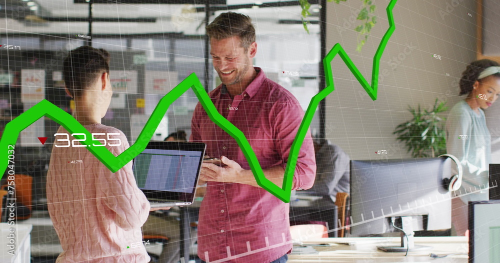 Poster image of graph and changing numbers over caucasian coworkers standing and discussing in office