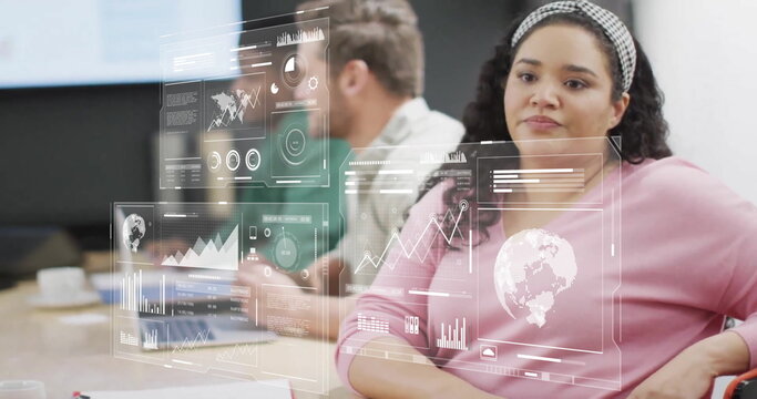 Image of data processing over diverse colleagues having meeting in office