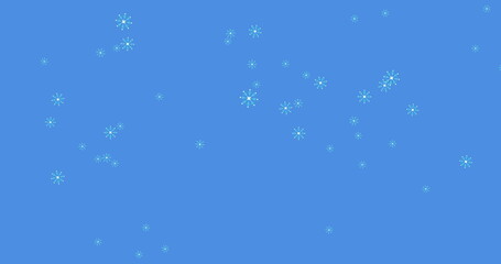 Digital image of multiple snowflakes icons falling against blue background