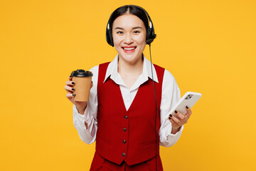 Employee operator business woman in set microphone headset for helpline assistance wear red vest...
