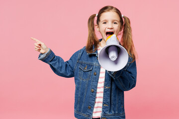 Little child kid girl 7-8 year old she wear denim shirt hold in hand megaphone scream announces...