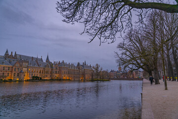 The Hague, Netherlands March 22 2023: Binnenhof castle (Dutch Parliament) with the Hofvijver lake...