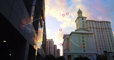 Composite image of network of connections against tall buildings in background