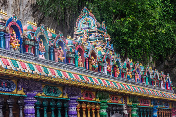 Colorful Hindu Statutes at Batu Caves, Kuala Lumpur, Malaysia.  Batu Caves is the most popular tourist attraction 