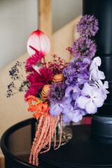 Wedding. Bridal bouquet of bright and colorful flowers с лентой