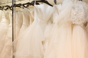 Fototapeta na wymiar wedding dress on hangers