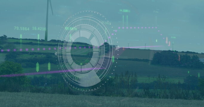 Image of radar, graph and loading bar over windmill on landscape against clear sky