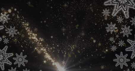 Image of christmas shooting star and snow falling over christmas decorations