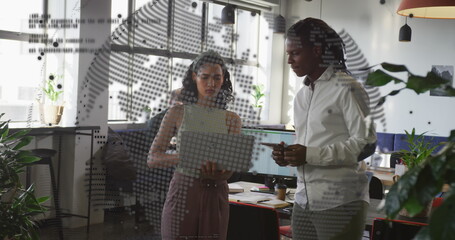 Image of world map and data processing over business people using laptop