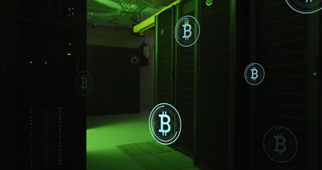 Image of multiple bitcoin symbols floating against computer server room