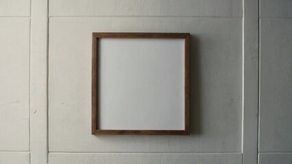 blank picture frame on white wall with copy space,