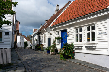 Street view in Historic area of the city, picturesque Ovre Strandgate. Stavanger, Norway.
