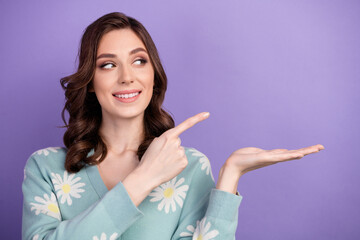 Photo of young pretty woman direct finger holding hand presentation recommend brand with reputation...