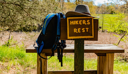 hikers rest on the bike bath 