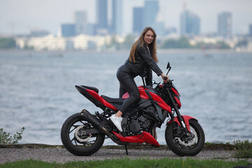 young woman on a motorcycle