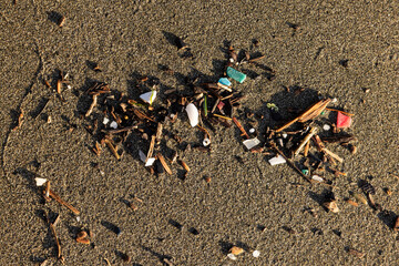 A pile of trash on the beach