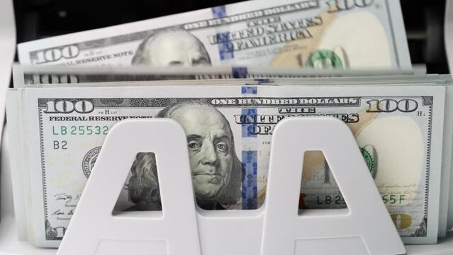 Money counting machine macro counter 100 bills american currency slow motion. Save money for prepare in the future. Bank automatic equipment for counting money close up. Cash money. 