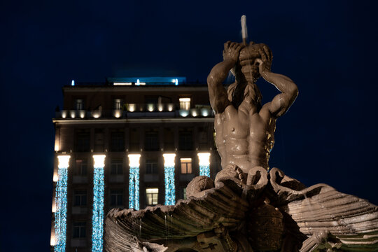 night scene of triton fountain in piazza barberini in rome - Powered by Adobe