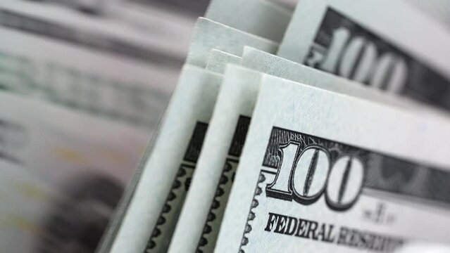 Macro view counter counting 100 bills american currency slow motion. Money concept. Save money for prepare in future. Bank automatic equipment for counting money close up. Cash money. 