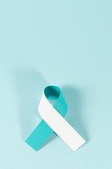 Cervical Cancer awareness month observed each year during January. Teal and White ribbon.
