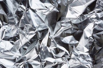 Crumpled Aluminum Foil with Folds and Creases as Background