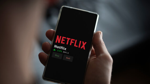 March 12th 2024 Los Gatos, California. The logo of Netflix on the screen of an exchange. Netflix price stocks, $NFLX on a device.