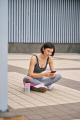 Fototapeta premium Woman on morning activity, rest, tired after training
