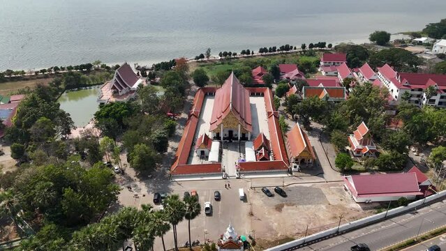 Aerial view of Wat sri khom kham temple in the downtown of Phayao city with Kwan Phayao the biggest freshwater lake in Northern Thailand.
